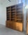 Large oak bookcase dating from the 1950s. Standing 2.5 meters tall and over 2 meters wide, it offers exceptional storage...