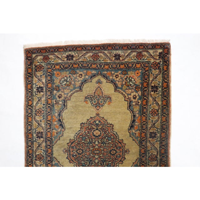 A mat size early 20th century Persian Tabriz Rug