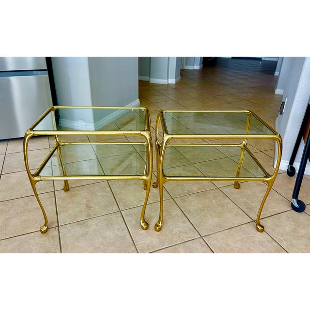 Pair Italian brass 2-tier rectangular side or occasional end tables, with clear glass insert tops. Unique design with...