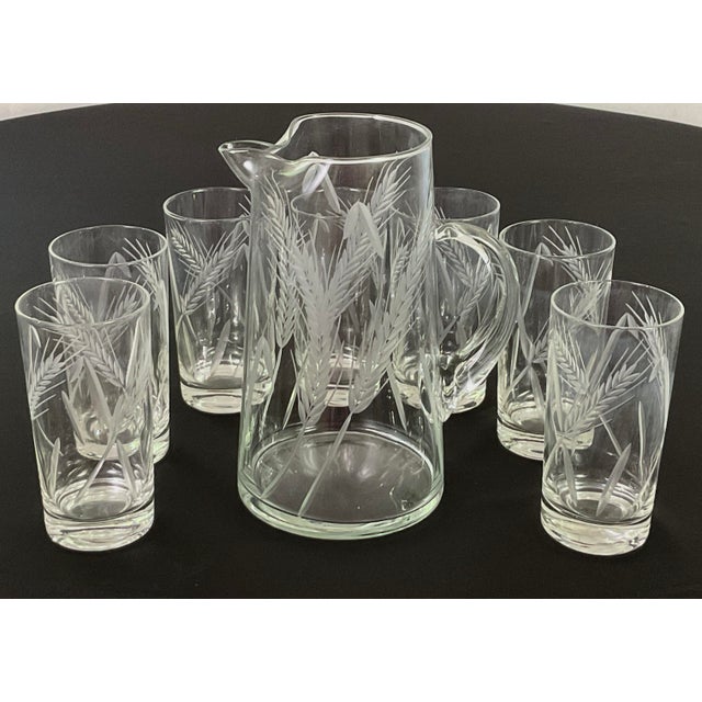 Rare-cut glass pitcher, and 7 glass set from the mid 20th century The pieces in the set R hand cut and slightly frosted...