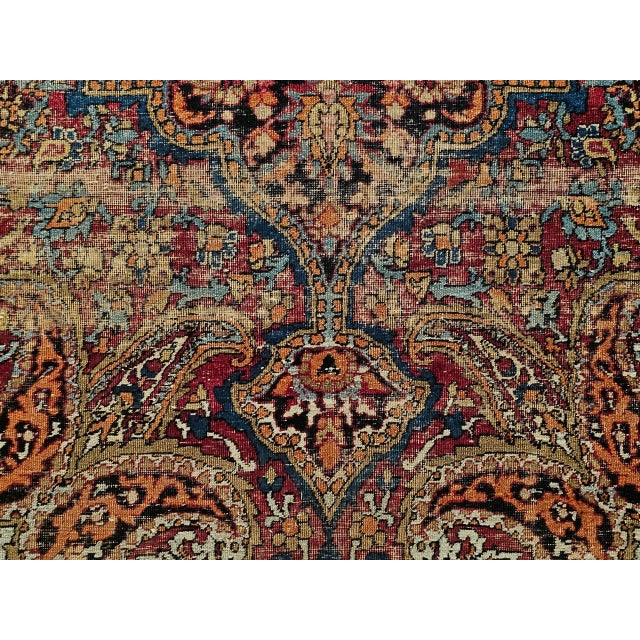 The 19th century silk Kashan area rug features an exquisite floral and medallion design, meticulously handwoven in the...