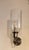 The Ann-Morris Finch Sconce with Hurricane Glass in polished nickel is a premium, handcrafted wall light that brings a...