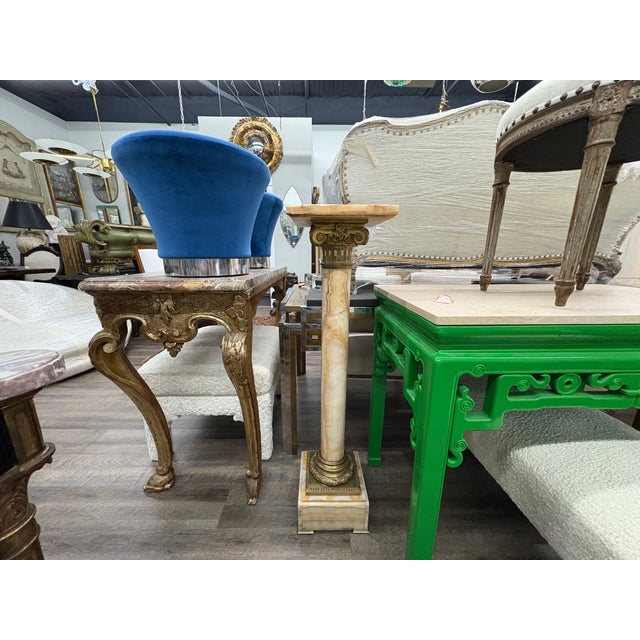 Pair Of 19th Century French Neoclassical Style Marble And Bronze Pedestals. Offered is a pair of antique French Louis XVI...