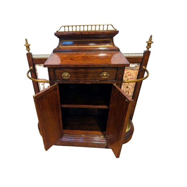 This French Louis XVI style luxury cabinet was exquisitely crafted and designed as a display cabinet, often referred to as...