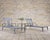 Amazing pair of dramatic Klismos chaise lounge chairs crafted from cast aluminum by Restoration Hardware (Now RH). The...