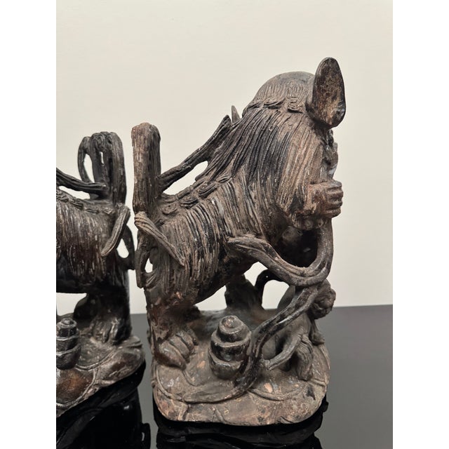 Mid 20th Century Pair of Intricately Carved Wooden Foo Dogs For Sale - Image 14 of 14