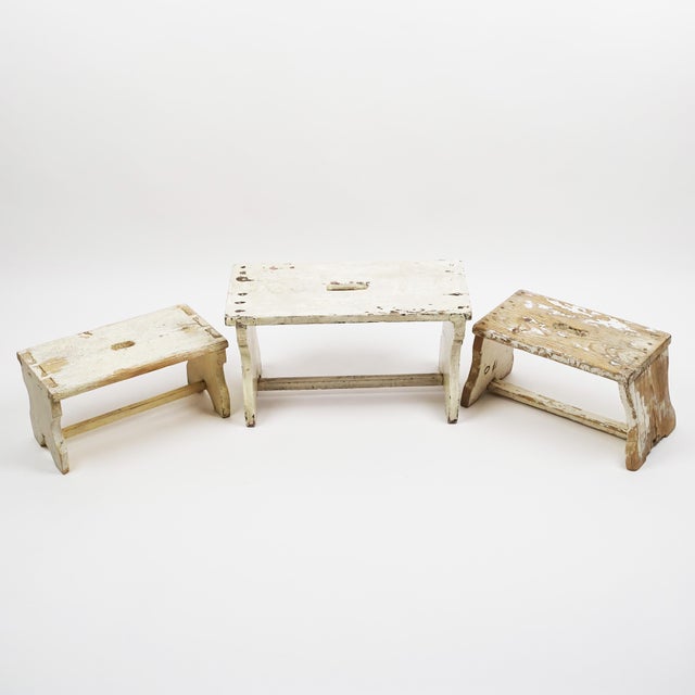 Simple, handcrafted early 20th century wooden farmhouse stools from Austria, with well made joinery and a beautiful...