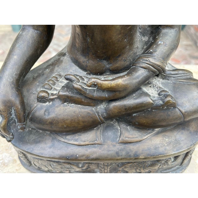 Large heavy iron Buddha. Beautifully aged with a soft warm patina to add a calm zen to any room of your home. Can also be...
