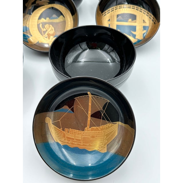 This exceptional set of five Japanese lacquer soup bowls embodies the refined elegance and narrative artistry of...