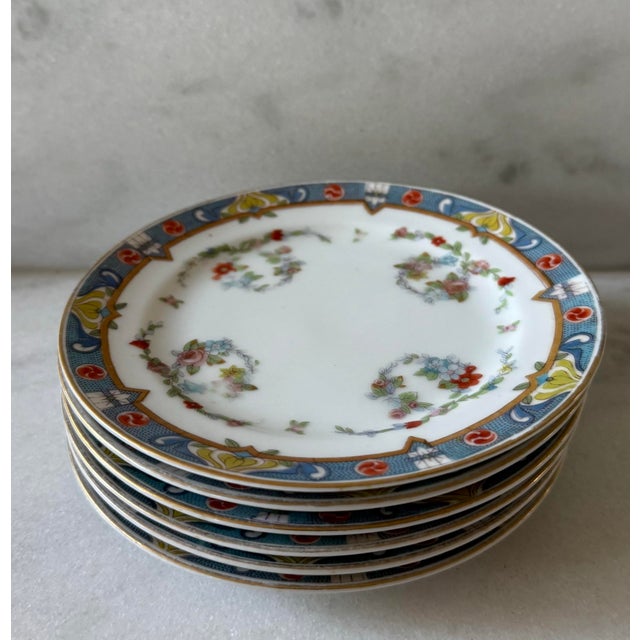Set of 6 vintage hand painted small plates with beautiful flora design. Made in Japan by Meito China.