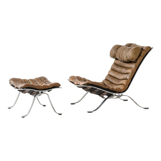 Set of Easy Chair and Ottoman in Leather and Steel from Arne Norell, 1970s For Sale