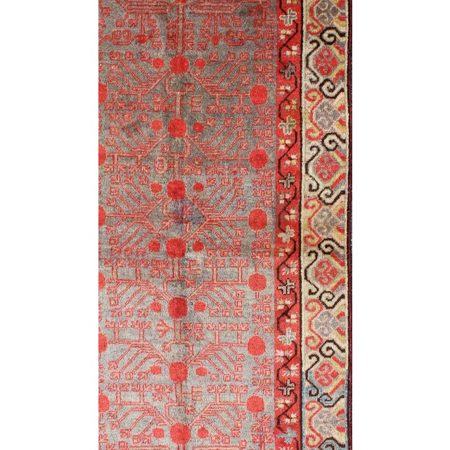 Intricate Vintage Khotan Rug With Sub-Geometric Design in Reds and Light Blue 3'10'' X 8'1'' For Sale - Image 4 of 6