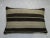 Pillow made from a vintage turkish kilim with cotton back. Zipper closure and foam insert provided. 15'' x 23''