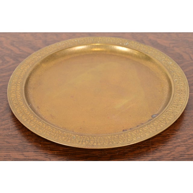 A gorgeous Arts & Crafts or Art Deco period gilt bronze large charger plate or serving tray with decorative border By...