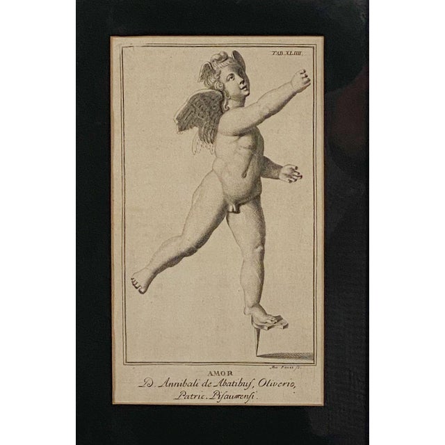 An 18th or 19th century Italian engraving of a putto.