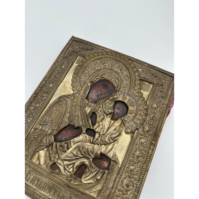 This is a 19th-century Orthodox icon featuring the depiction of the Vladimir Mother of God. The artwork is crafted using...