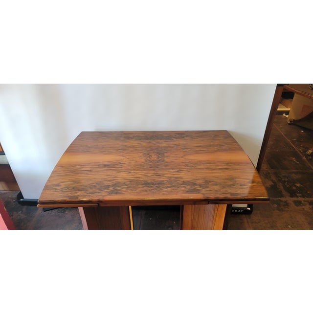 A nice draw leaf Art Deco Dining Table made by Lebus company. Leaf store under top and easily slide out. A fantastic wood...