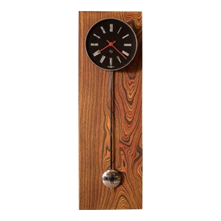 Mid Century Modern Zebrawood and Chrome Wall Clock by Howard Miller For Sale