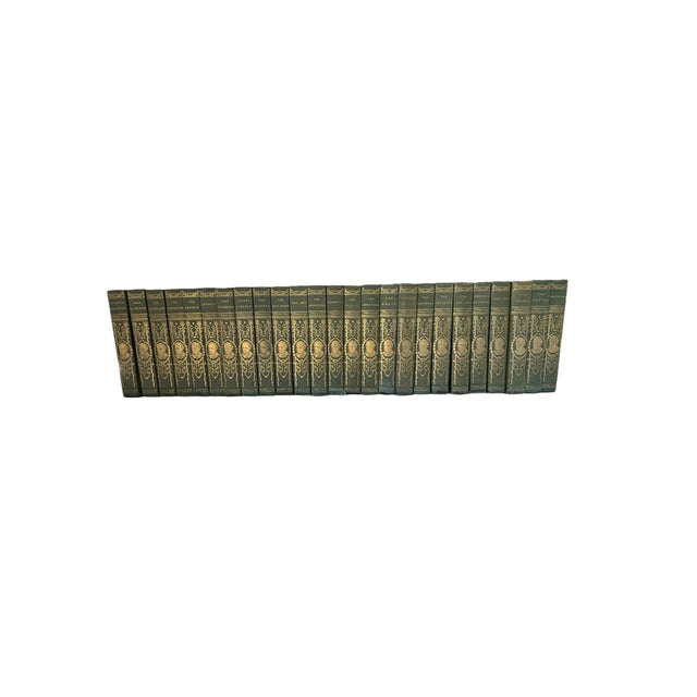 Offering an expansive, highly decorative grouping of 25 antique uniform hardcover literary books featuring the works of...