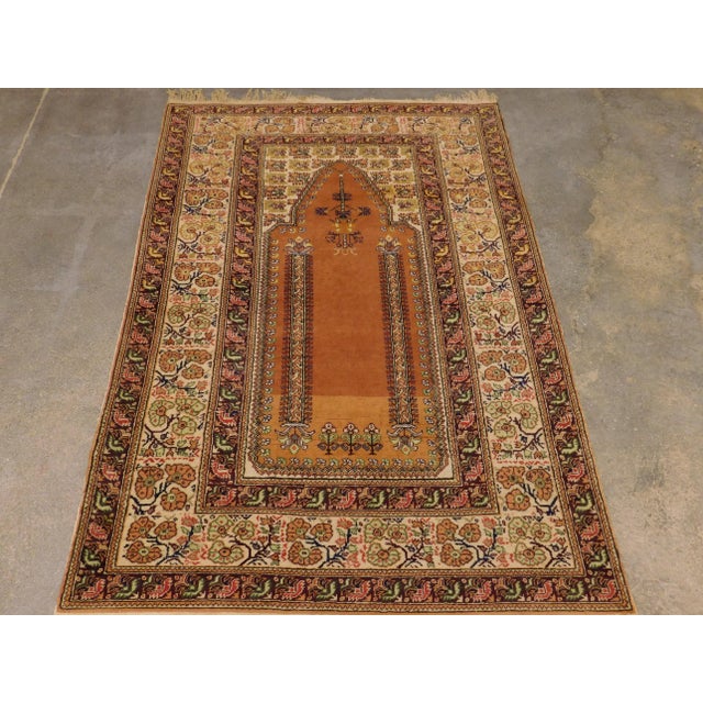 Vintage Turkish prayer rug. Wool pile on cotton foundation. Genuine hand knotted. great condition. 4'x 5'6" Can be used as...