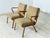 For sale are two stylish vintage armchairs from the 1960s. These armchairs impress with their clean lines, curved...