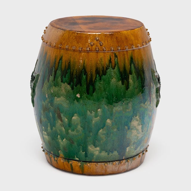 Drenched in color, this ceramic garden drum is drip glazed in the manner of ancient Chinese sancai ware, cloaked in...