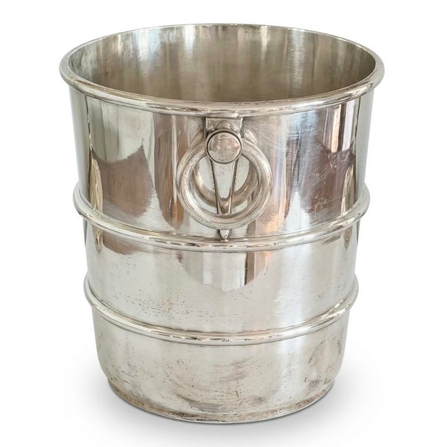This beautiful Gorham hotel silver ice bucket, crafted in 1927, features an elegant Old English style monogram "B"—likely...