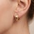 Elevate your everyday look with these sophisticated and modern huggie hoop earrings. Expertly crafted with a wide,...