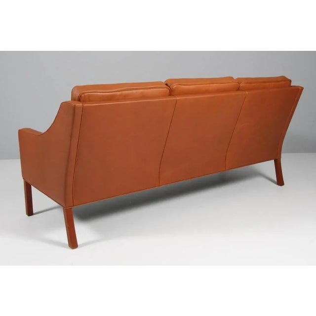 Børge Mogensen three-seat sofa new upholstery with walnut elegance aniline leather. Legs of teak. Model 2209, made by...
