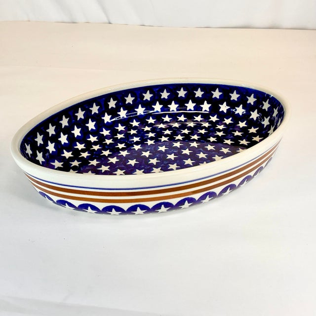 From our private collection. This is a hand-painted Oval Baker Lasagna Server from Boleslaeiec Pottery. The pattern is...