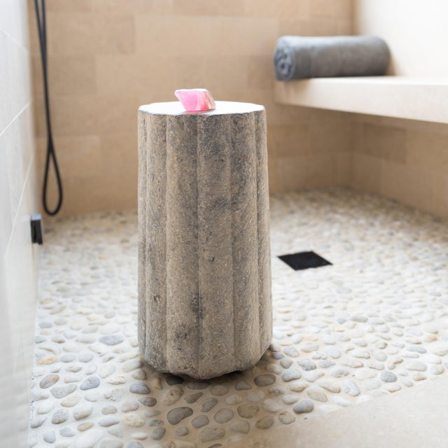 This unusual stone pedestal is actually a late 19th-century cylindrical mill stone. Hand-carved of solid limestone with a...