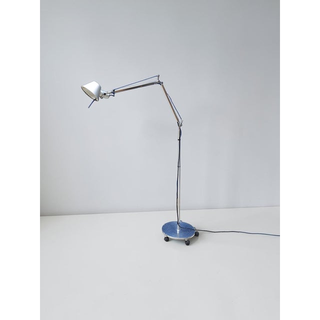 This iconic vintage Artemide floor lamp, the "Tolomeo" model, designed by Lucchi & Fassina in the 1980s, is a masterpiece...