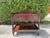 Vintage Ralph Lauren mahogany two-tier server featuring a shaped gallery back with carved scroll detailing, a spacious...