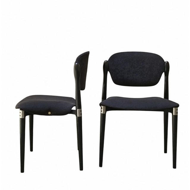 Elegant set of 2 model S83 chairs designed by Eugenio Gerli and manufactured by Tecno, Italy 1962. Made of black painted...