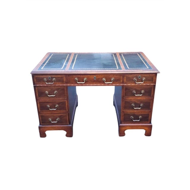 A rare Hespeler Furniture Company Chippendale Inlaid Mahogany and Tooled Green Leather and Stenciled Top Partners Desk...