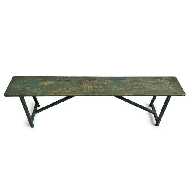Vintage rustic wood and iron school bench with original blue finish. Characteristic signs of age and use add to the unique...