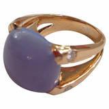18kt Yellow gold Cabochon Cushion cut chalcedony ring with 4 diamonds. The center cabochon measires approximately 15mm...