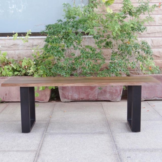 The Maelira Wooden Brown Dining Bench brings solid wood construction and a rich brown stain finish to your dining space....