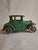 An Exceptional "As-Found" Early 1920s American Cast Iron Toy Offered is an antique cast iron Ford Model T Coupe...