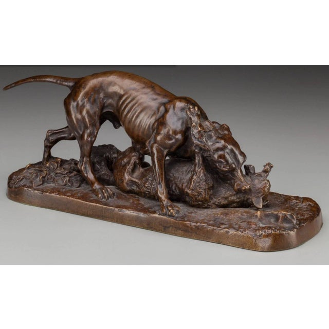 Pierre Jules Mene French, 19th Century A truly stunning and moving bronze of dogs fighting for fish. Rich brown patina 13...