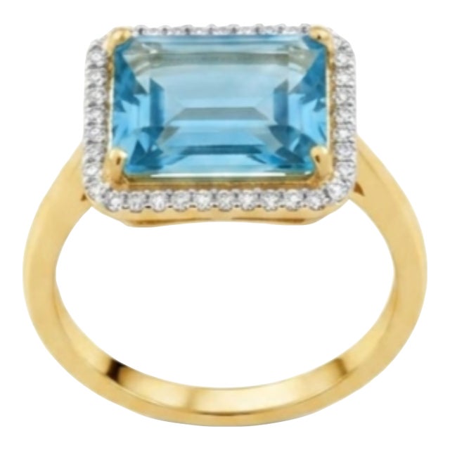 Natural Blue Topaz 5.70cts & Diamond 0.20cts Ring in 18k Gold For Sale
