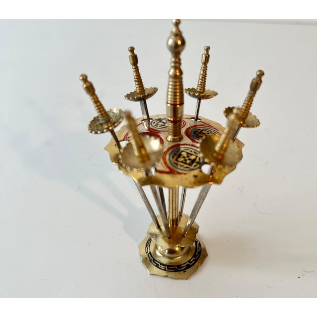 A wonderfully Iconic and creative and useful set of Mid-Century cocktail picks. The perfect pick for your Martini Olives...