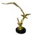 Elevate your space with this striking mid-century modern brass sculpture featuring three graceful seagulls captured...