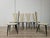 An elegant set of six dining chairs by Umberto Mascagni, made in Italy in the 1950s, featuring a refined retro design and...
