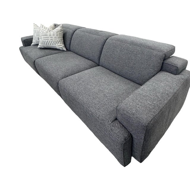Contemporary Natuzzi grey sofa in pristine condition. Ultra comfortable and features motorized recline function.