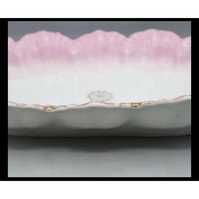 This 1880’s “Carlsbad” porcelain platter. The platter is marked”made in Austria” on the bottom.