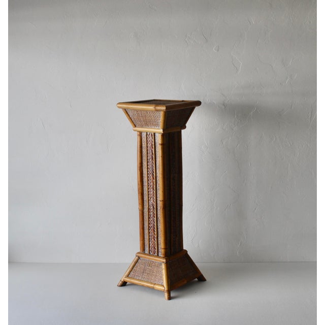1980s Vintage Bamboo Rattan Pedestal Column Plant Stand. This is for indoor use only to display home decor or plants. All...