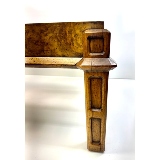 Striking Italian modern coffee table in the manner of Milo Baughman, featuring a richly figured burl wood case inset with...