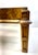 Striking Italian modern coffee table in the manner of Milo Baughman, featuring a richly figured burl wood case inset with...