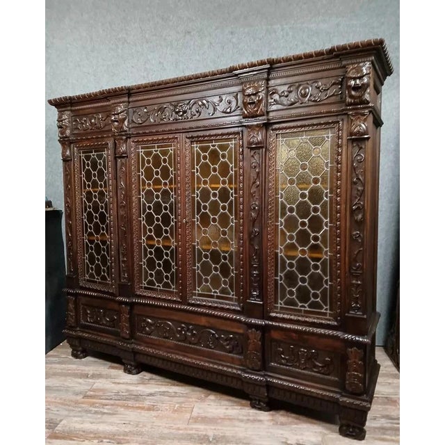 Renaissance-style walnut bookcase, circa 1850 General An imposing Renaissance-style bookcase, crafted entirely from solid...